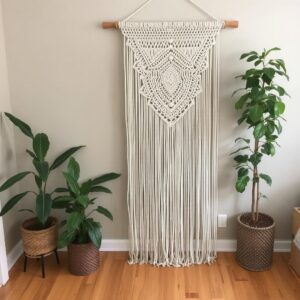 A finished macramé wall hanging in a cozy living room.